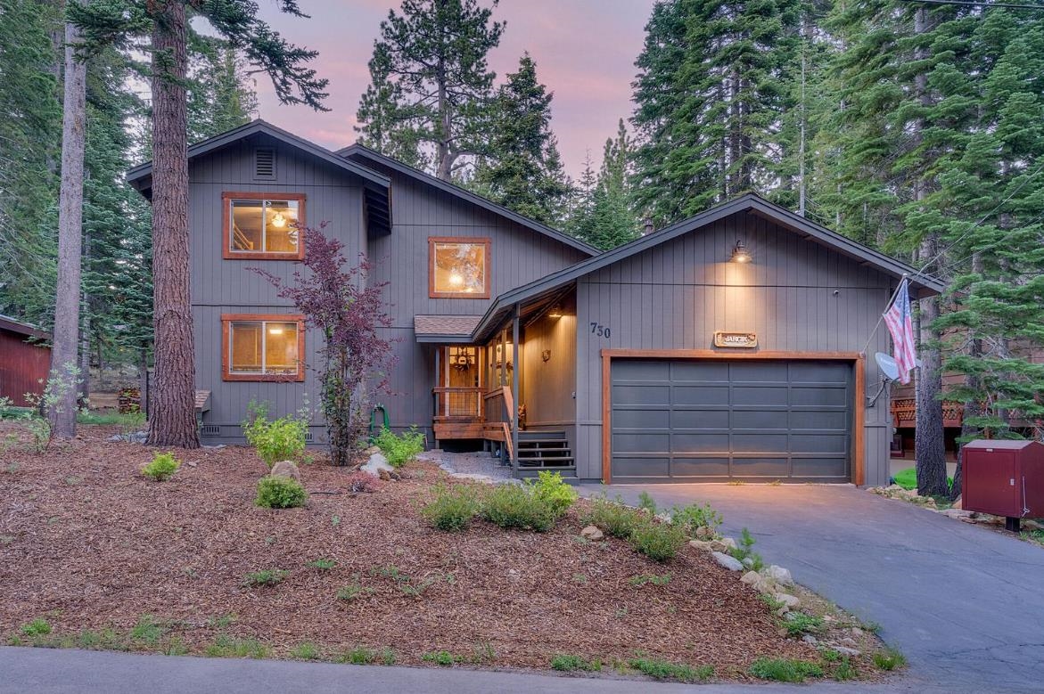 730 Cascade Circle Homewood, CA 96141 - Photo 3 of 22 a front view of a house with garden