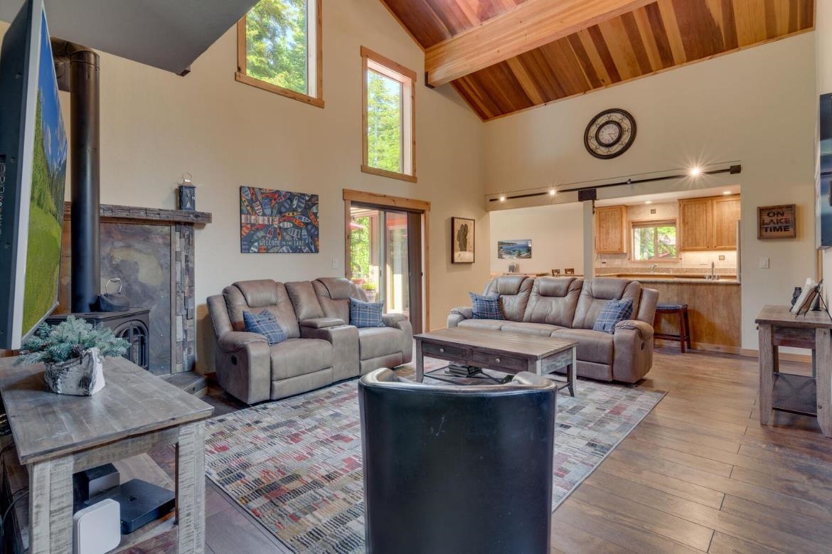 730 Cascade Circle Homewood, CA 96141 - Photo 4 of 22 a living room with furniture and a large window