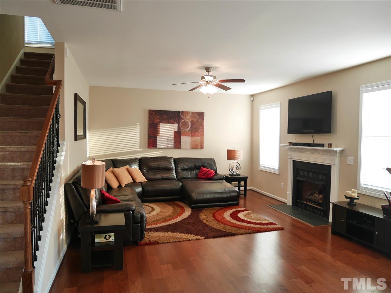 2802 Armadale Lane Raleigh, NC 27616 - Photo 25 of 25 The open floor plan featuring gas burning fireplace and lots of natural light