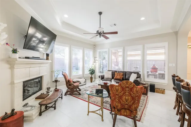 a living room with furniture or outdoor view and a fireplace
