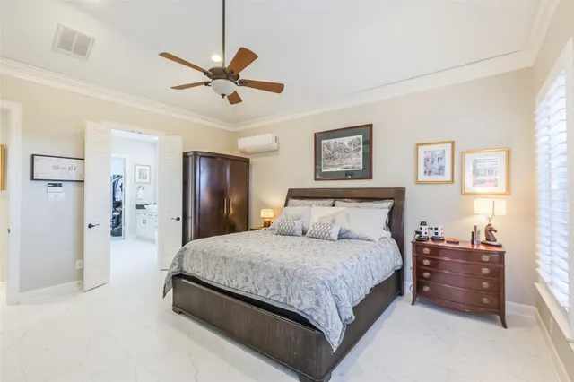 a bathroom with a double vanity sink toilet mirror and bathtub