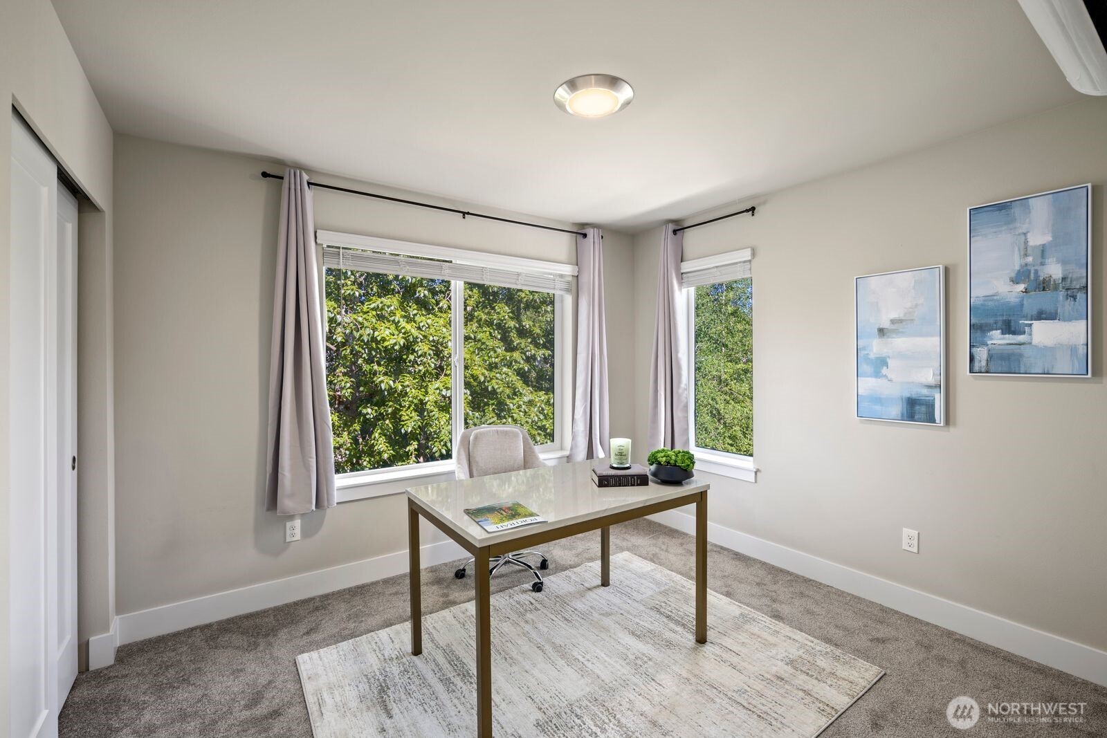 826 238th Place Southeast, Unit F Bothell, WA 98021 - Photo 20 of 39 a living room with furniture and a window