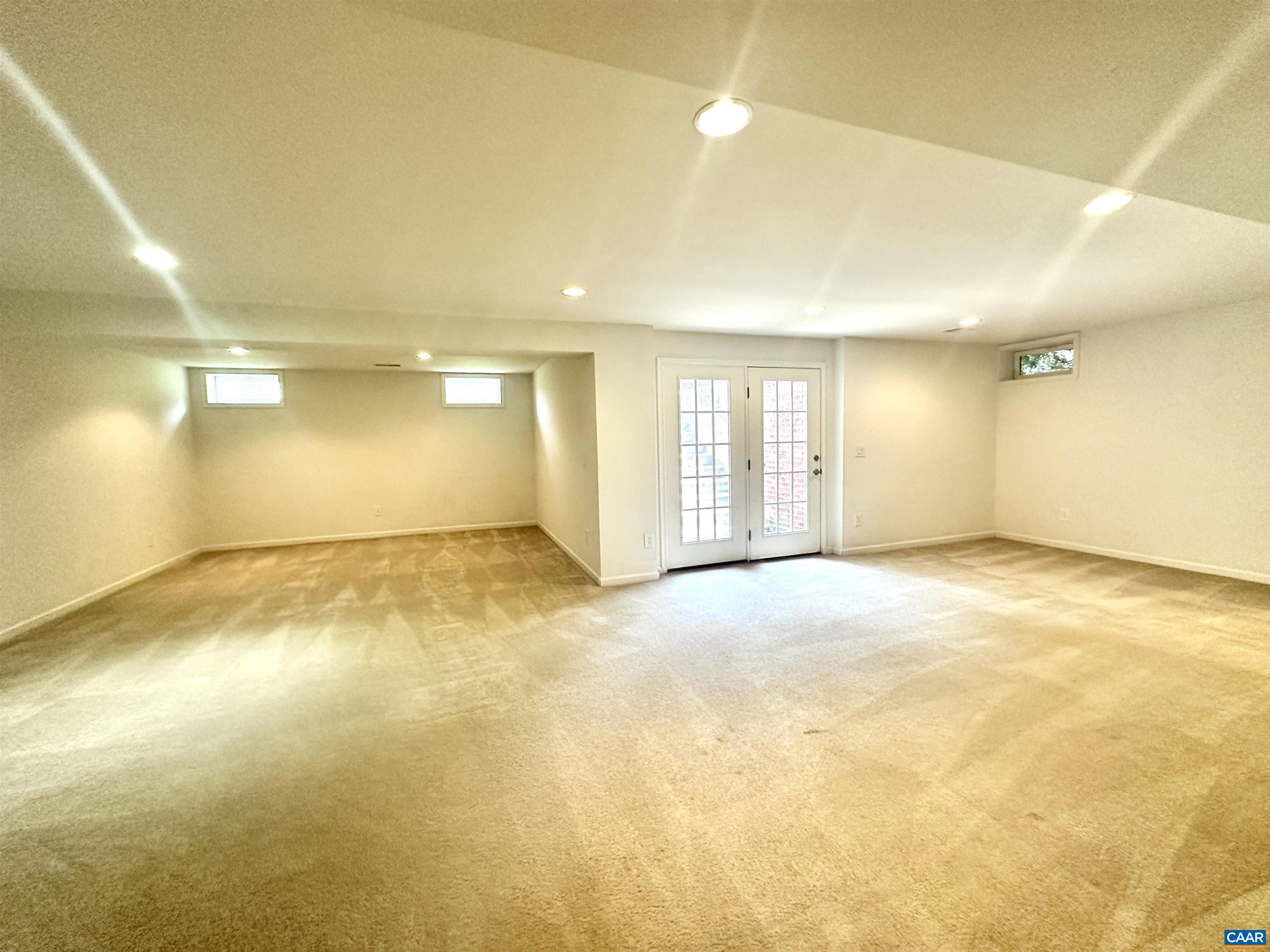 252 Millstream Drive Crozet, VA 22932 - Photo 17 of 41 an empty room with a empty space and windows