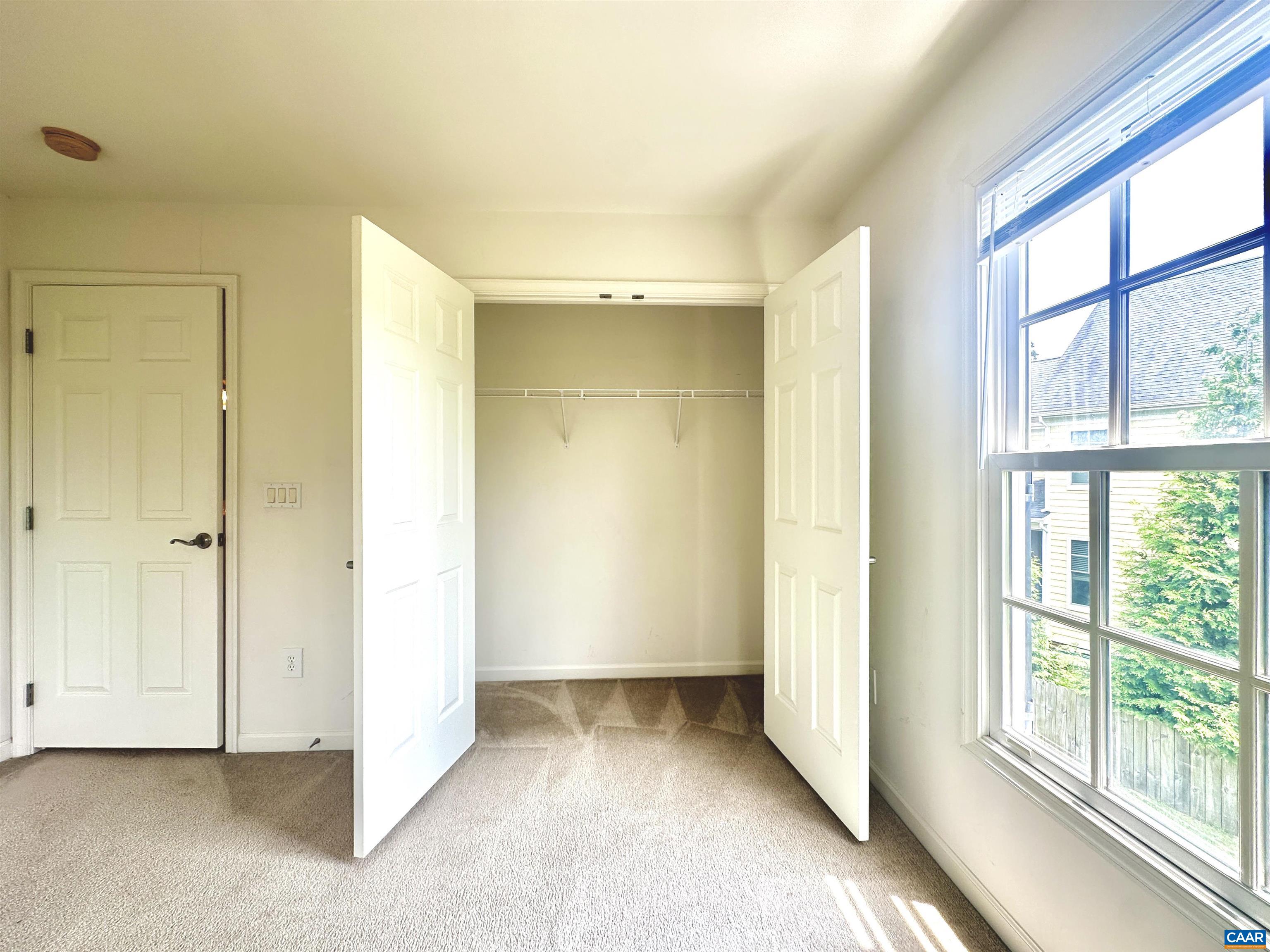 252 Millstream Drive Crozet, VA 22932 - Photo 21 of 41 a view of an empty room with a window