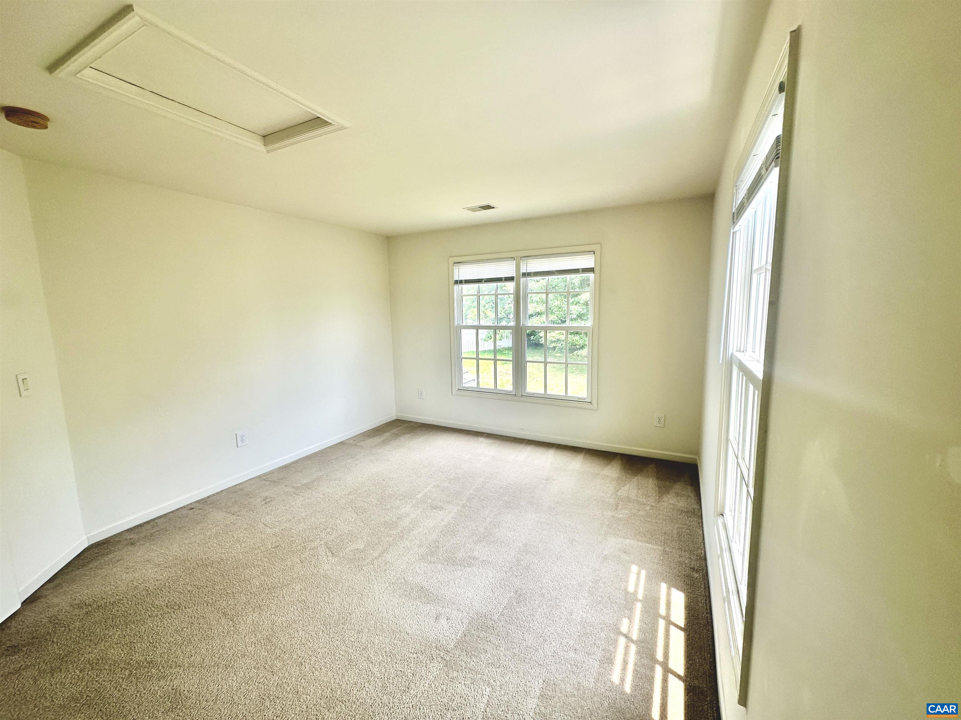 252 Millstream Drive Crozet, VA 22932 - Photo 23 of 41 an empty room with windows