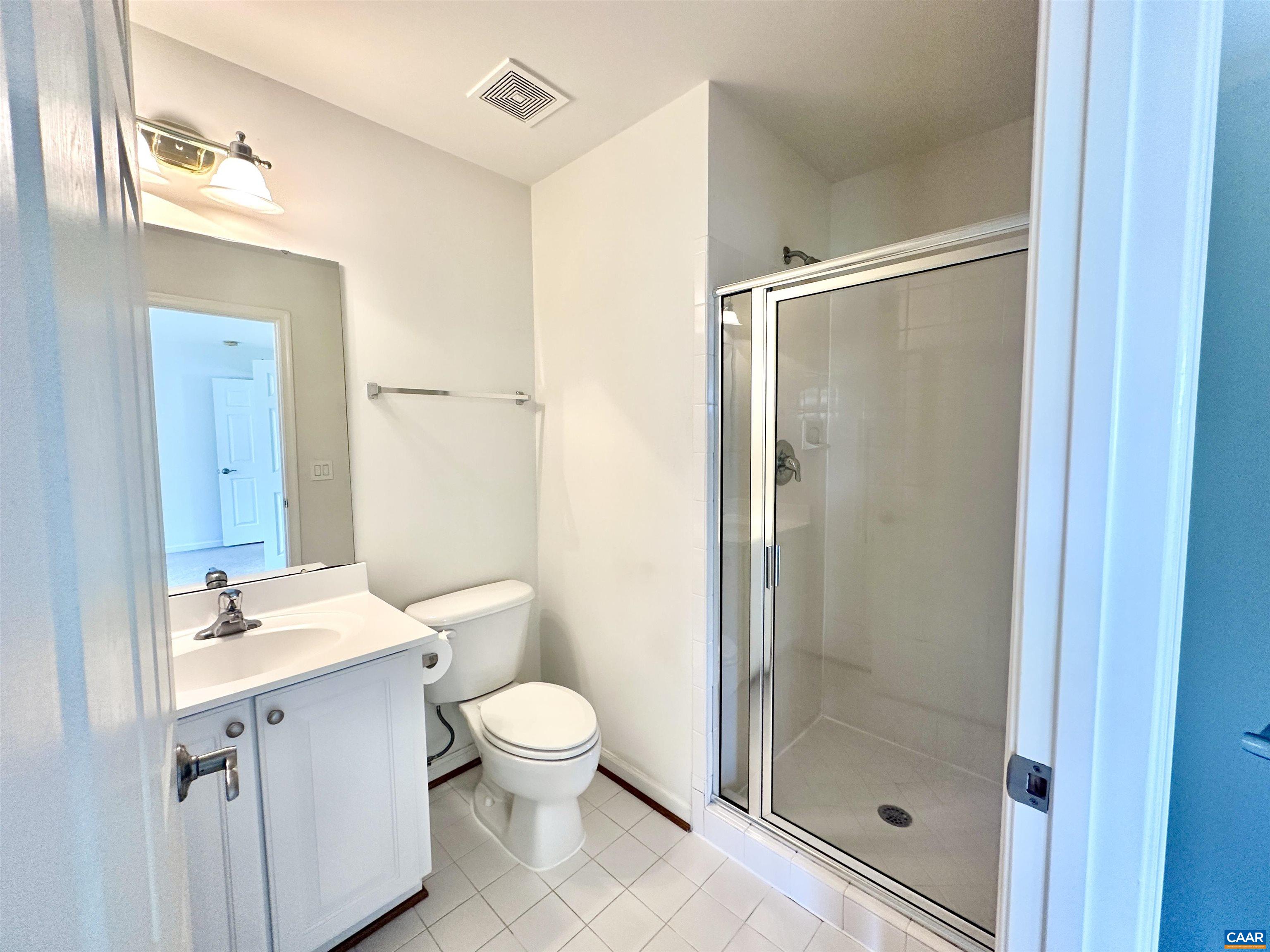 252 Millstream Drive Crozet, VA 22932 - Photo 25 of 41 a bathroom with a toilet a sink and shower
