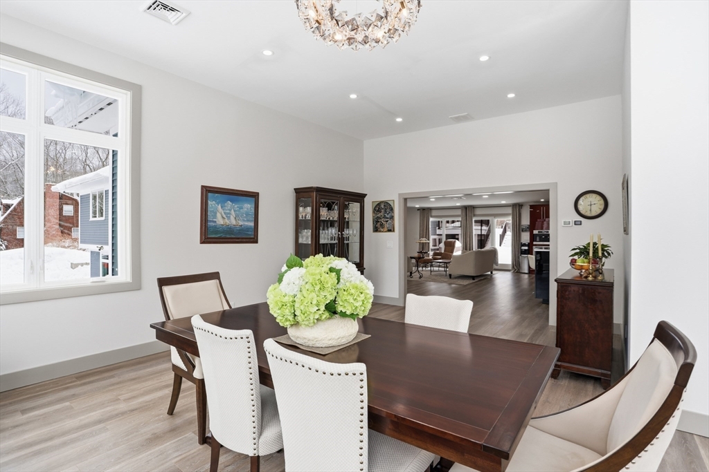 235 Kemp Street Dunstable, MA 01827 - Photo 10 of 42 a view of a dining room with furniture and wooden floor