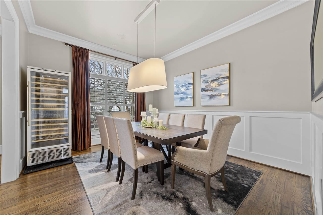 503 Guilford Circle Raleigh, NC 27608 - Photo 12 of 28 A formal dining room off of the kitchen / living room provides a great separate space for sharing meals and entertaining. Complete with wine fridge for over the top get togethers! Dining Room