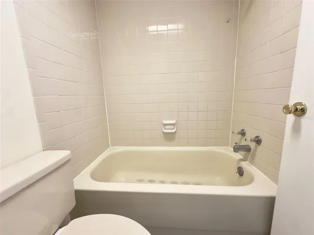 a view of a house with a garden