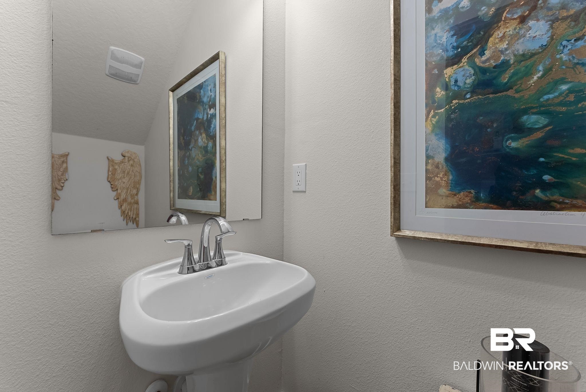 16607 Prado Loop Loxley, AL 36551 - Photo 38 of 46 White pedestal sink featuring a chrome faucet