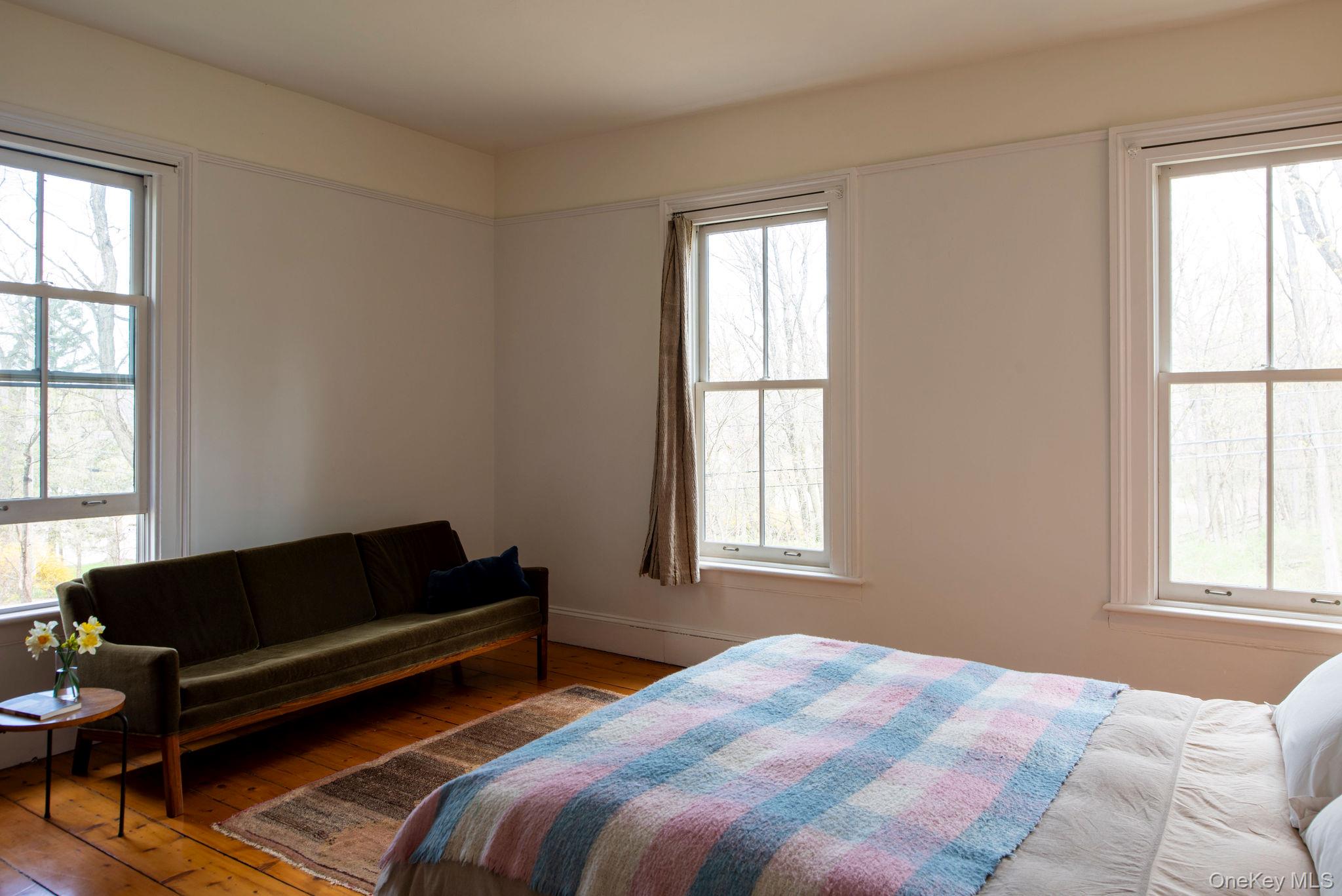 225 Barrytown Road Barrytown, NY 12507 - Photo 15 of 22 a bedroom with a bed a window and a couch