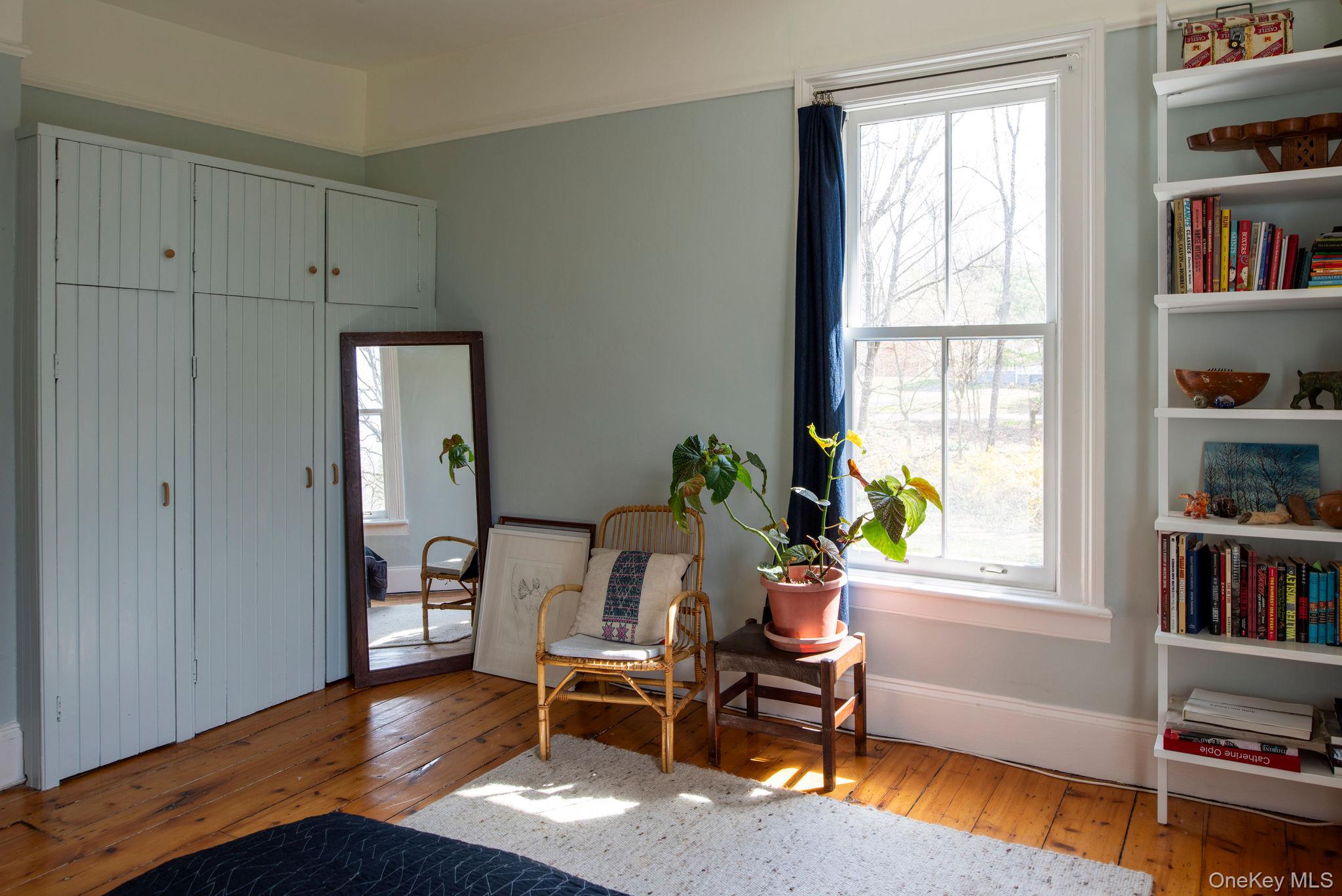 225 Barrytown Road Barrytown, NY 12507 - Photo 18 of 22 a living room with furniture and a book shelf