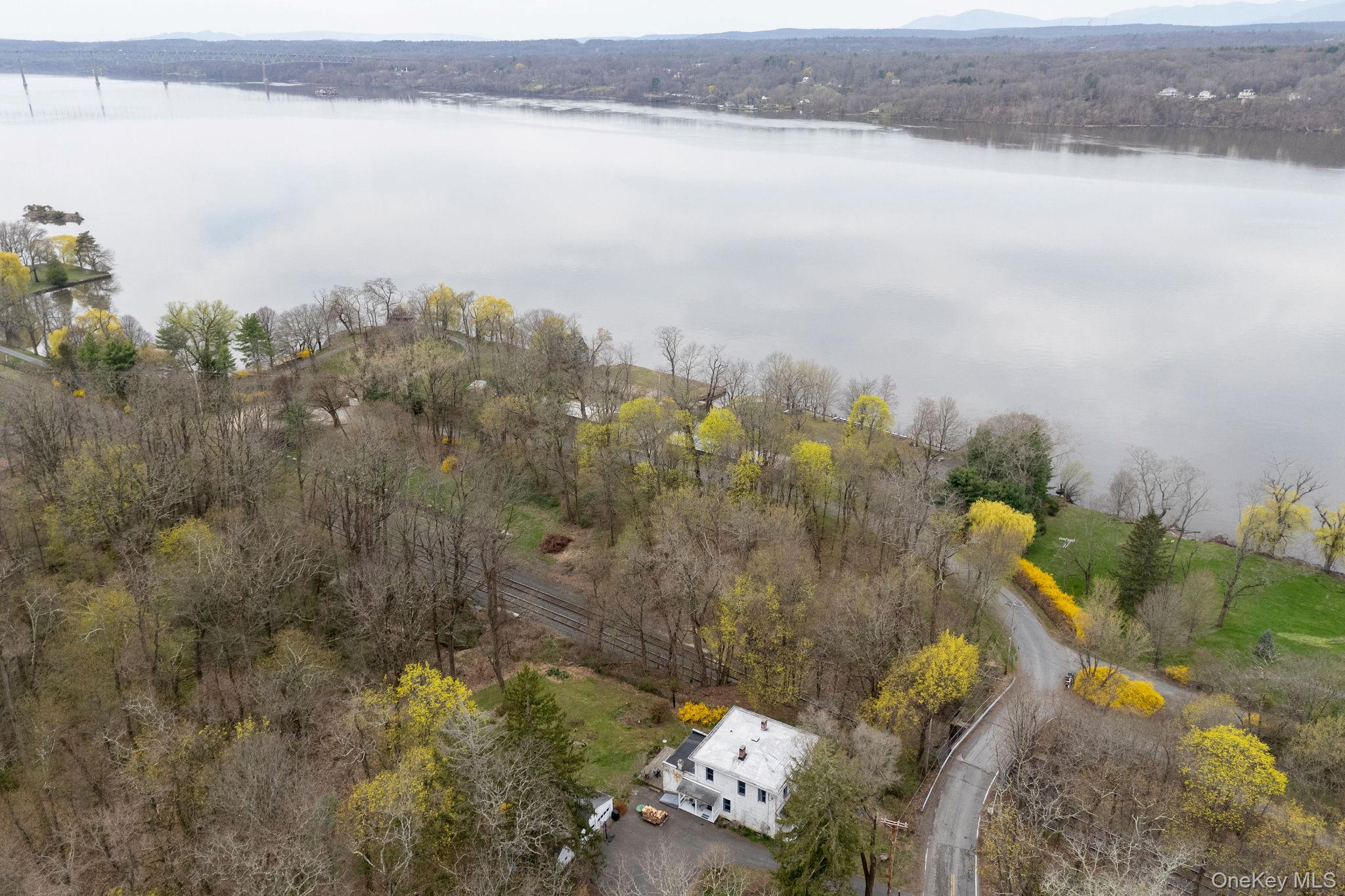 225 Barrytown Road Barrytown, NY 12507 - Photo 21 of 22 a view of a lake with a mountain in the background