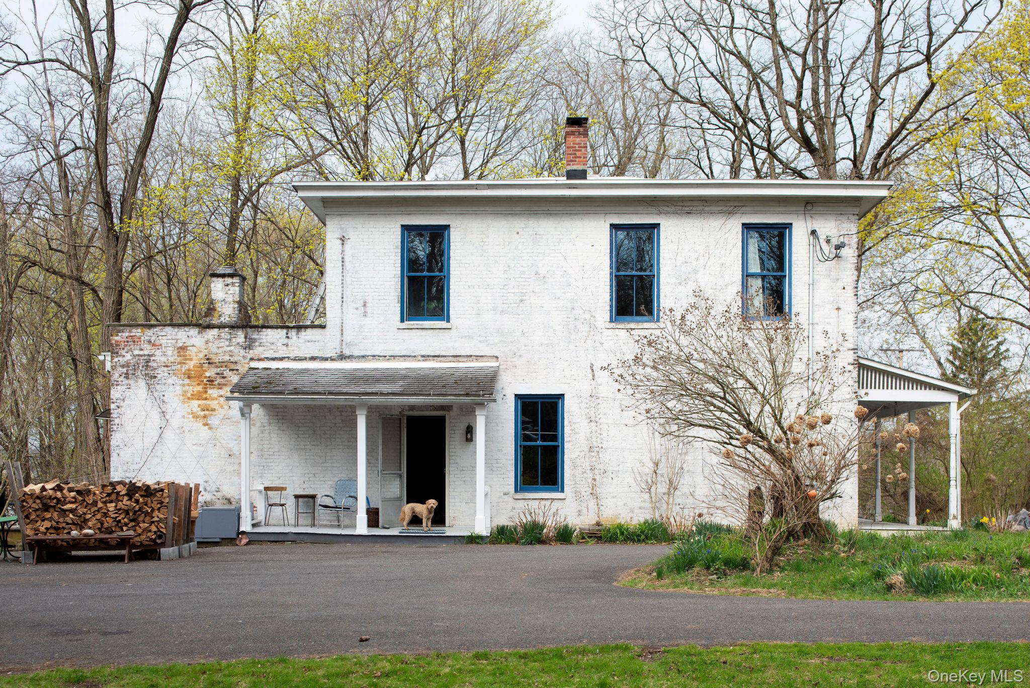 225 Barrytown Road Barrytown, NY 12507 - Photo 22 of 22 a front view of a house with lots of trees