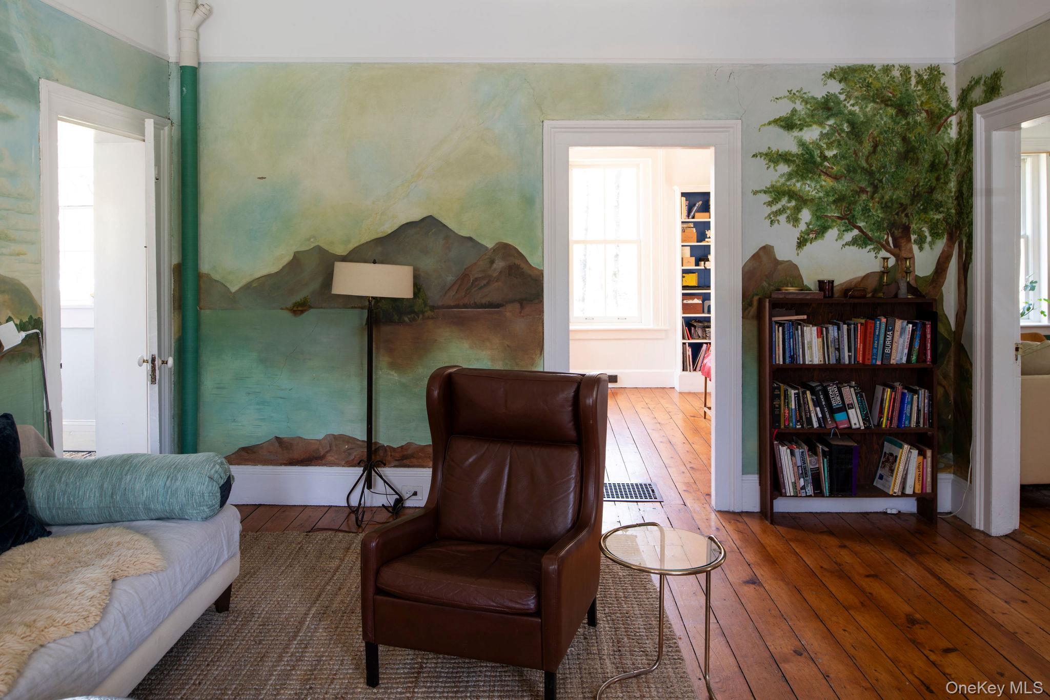 225 Barrytown Road Barrytown, NY 12507 - Photo 6 of 22 a living room with furniture and a book shelf
