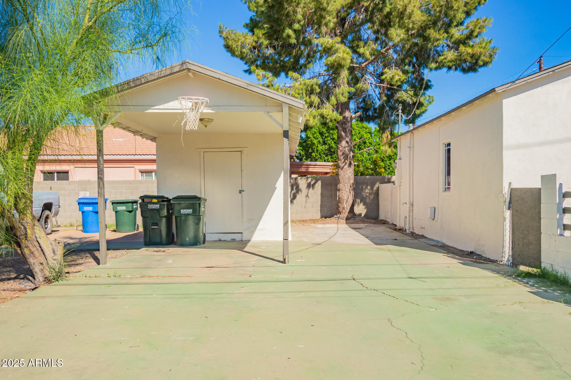 1010 East Chipman Road Phoenix, AZ 85040 - Photo 21 of 23 a view of a house with a backyard