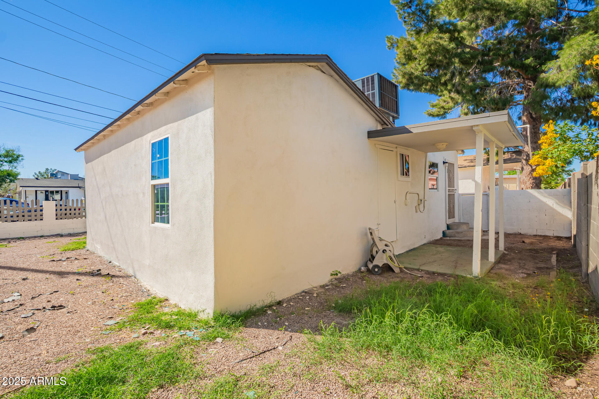 1010 East Chipman Road Phoenix, AZ 85040 - Photo 23 of 23 a front view of a house with a yard