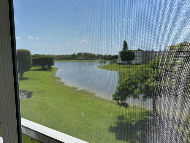 a view of a lake from a balcony