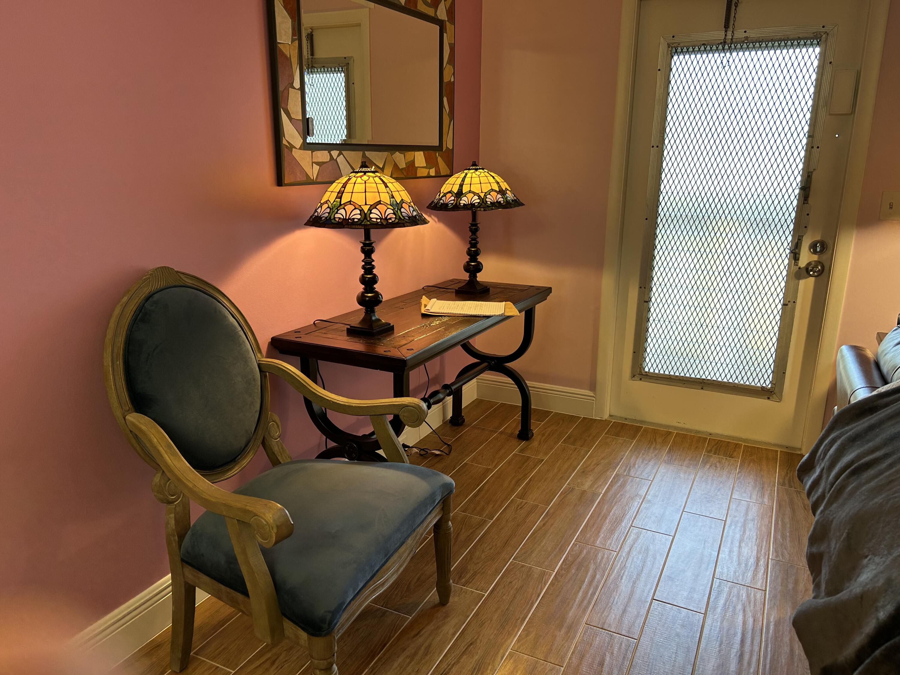 3070 Cornwall East, Unit 3070D Boca Raton, FL 33434 - Photo 15 of 22 a dining room with furniture and wooden floor
