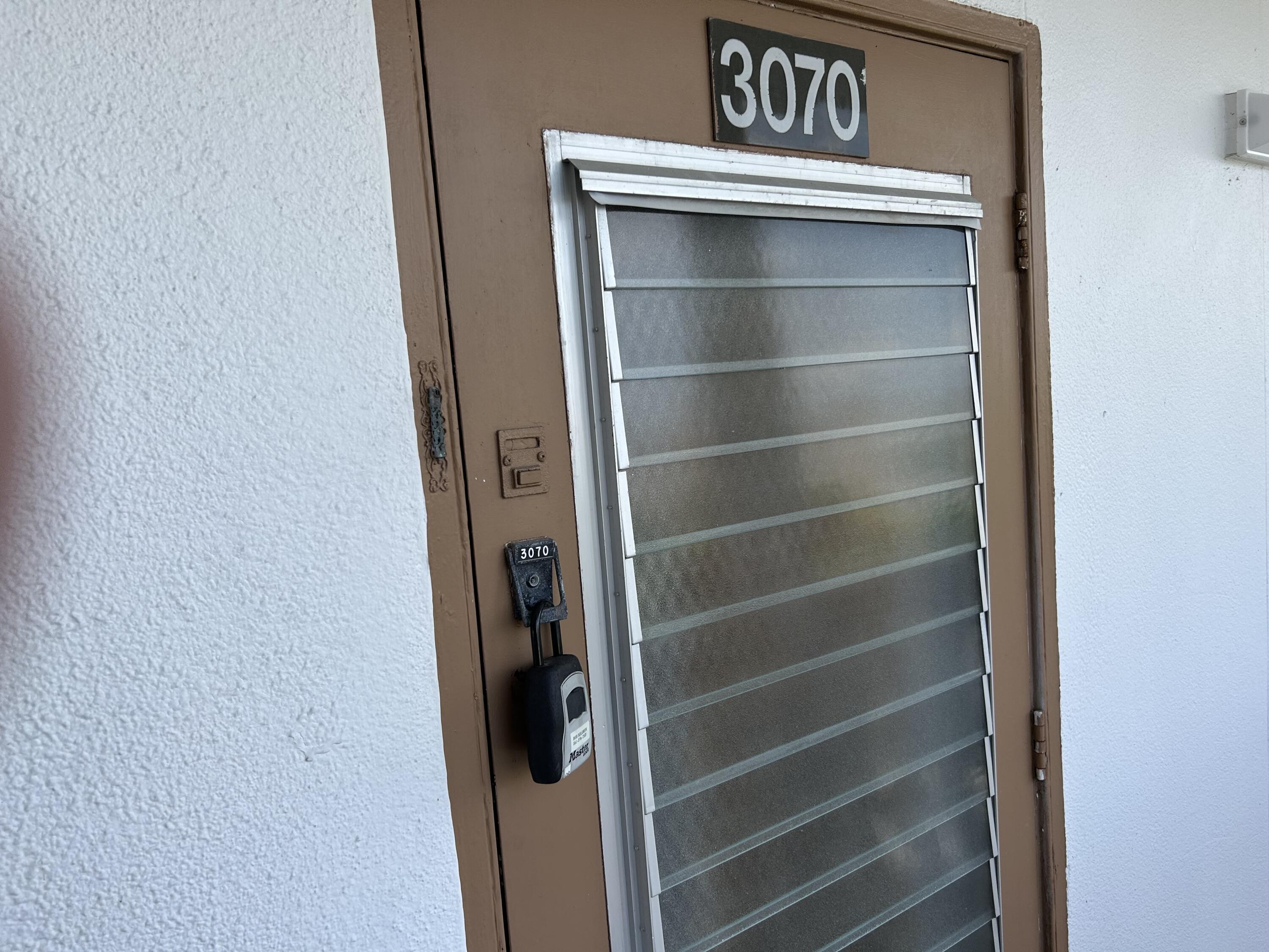 3070 Cornwall East, Unit 3070D Boca Raton, FL 33434 - Photo 19 of 22 a view of walk in closet with empty racks