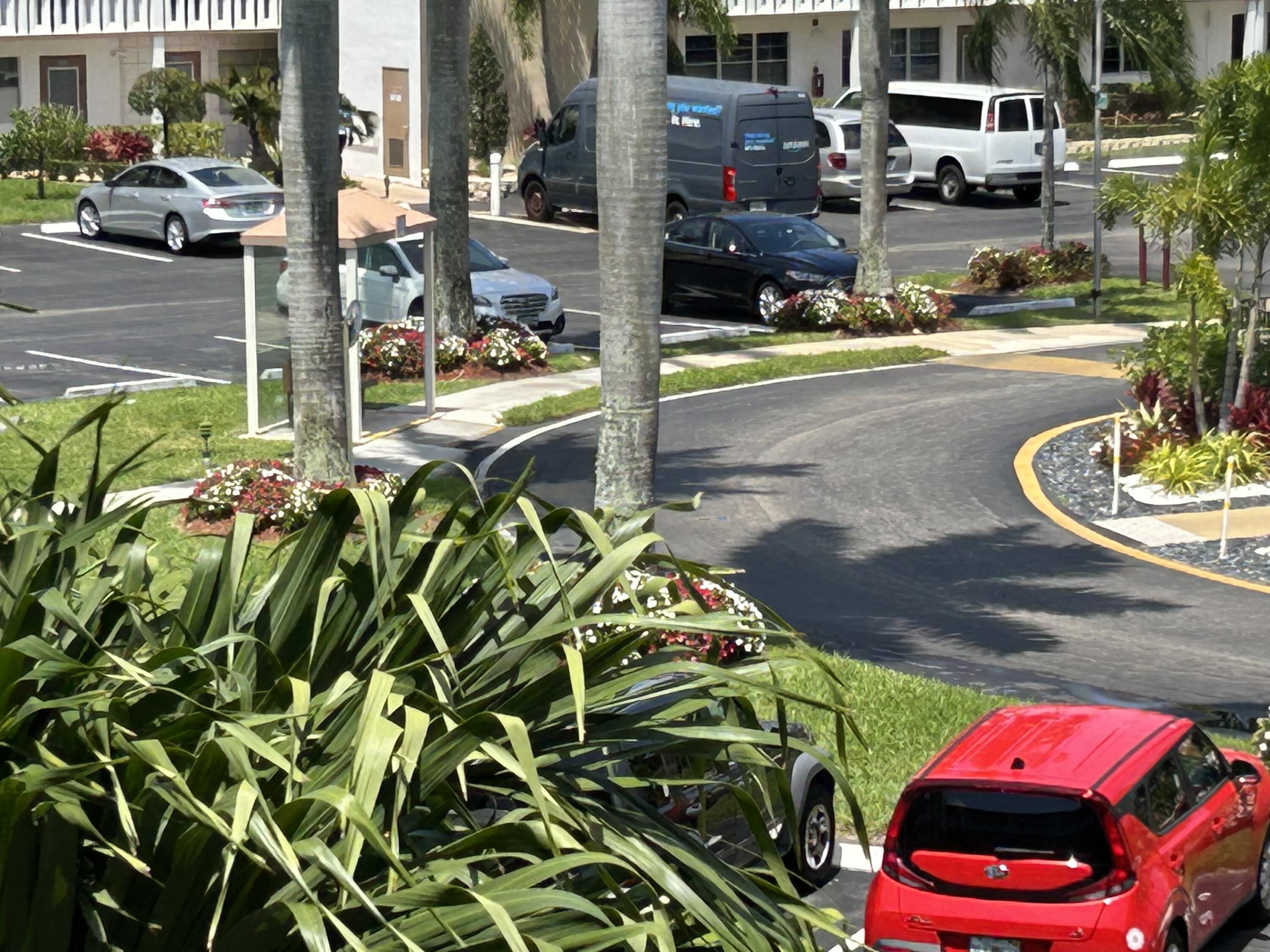 3070 Cornwall East, Unit 3070D Boca Raton, FL 33434 - Photo 21 of 22 a view of outdoor space and garden