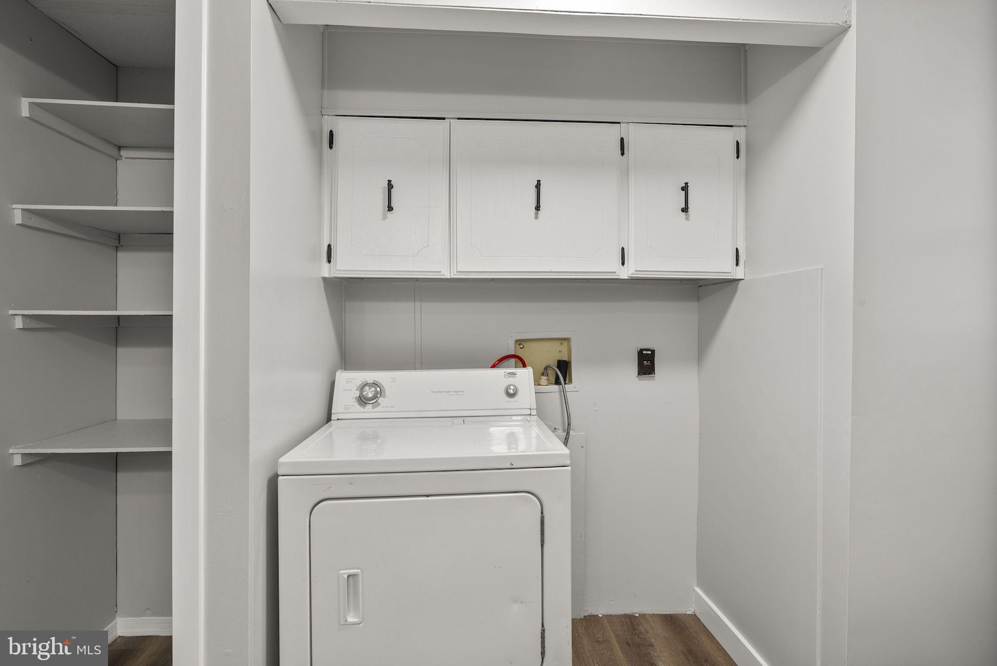 635 Sunset Strip Brooklyn, MD 21225 - Photo 17 of 27 a utility room with dryer and washer