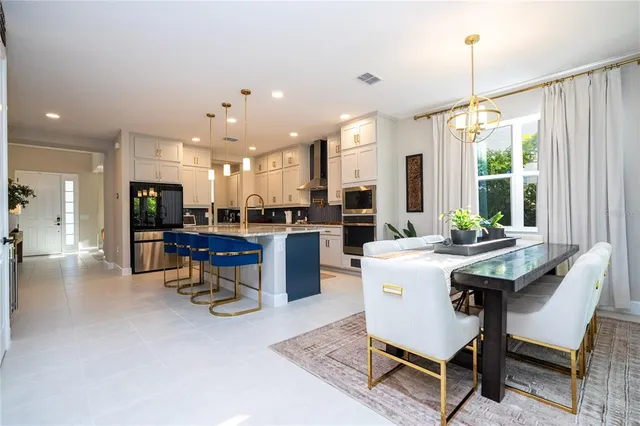 a bed room with a bed and a lamp