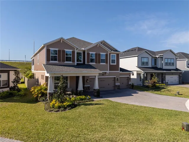 a front view of a house with a yard outdoor seating and yard
