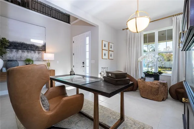 a large kitchen with stainless steel appliances granite countertop a large counter top and a stove