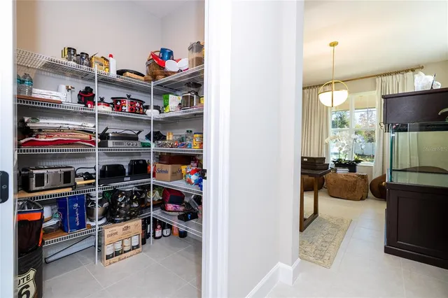 a large kitchen with stainless steel appliances kitchen island granite countertop a large counter top and stove