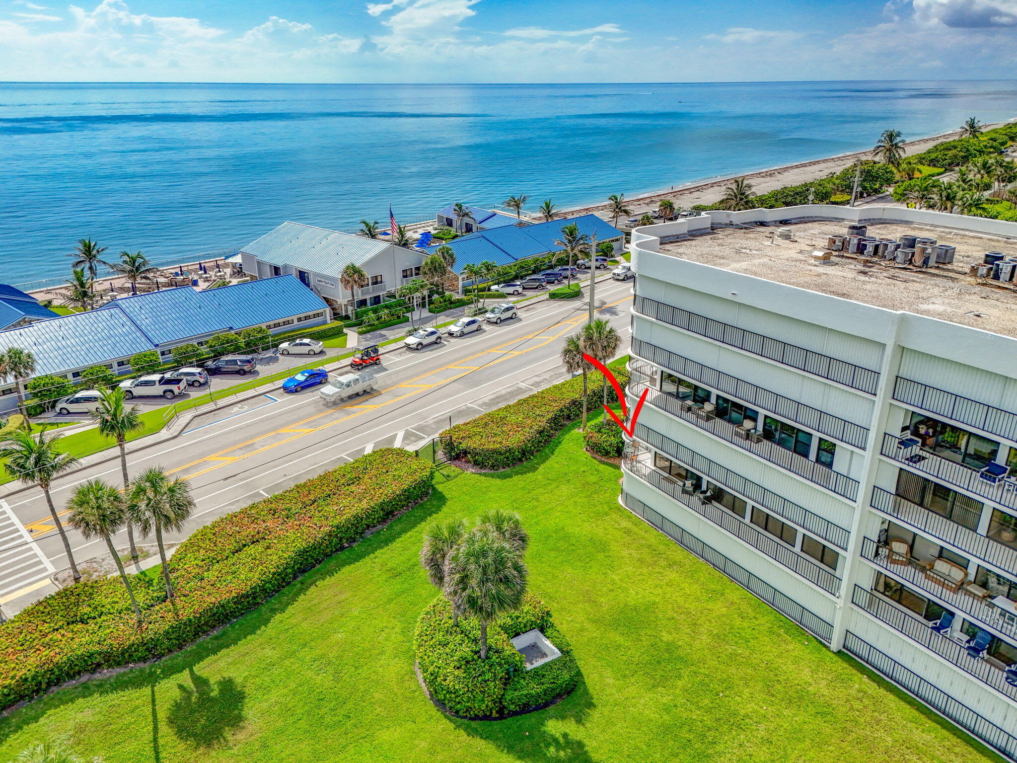 1300 Florida A1A, Unit 201 Jupiter, FL 33477 - Photo 2 of 77 104-web-or-mls-DJI_20250730102041_0391_D