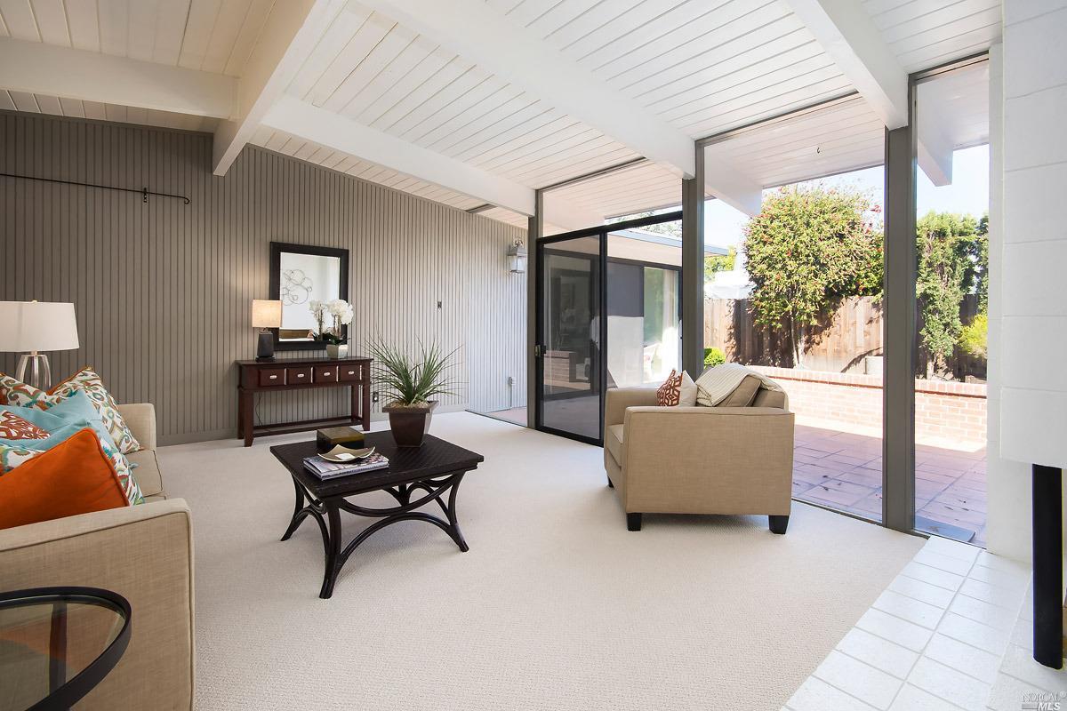 772 Montecillo Road San Rafael, CA 94903 - Photo 1 of 1 a living room with furniture and a window