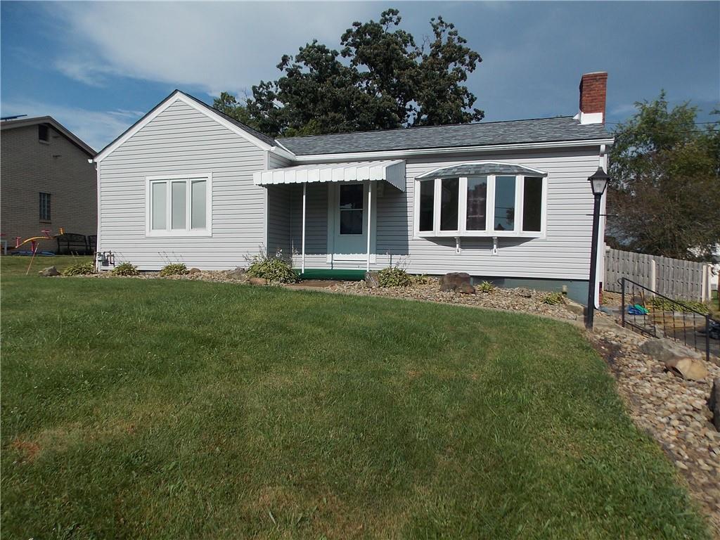 511 Pearl Avenue Mars, PA 16046 - Photo 1 of 21 a front view of a house with a yard