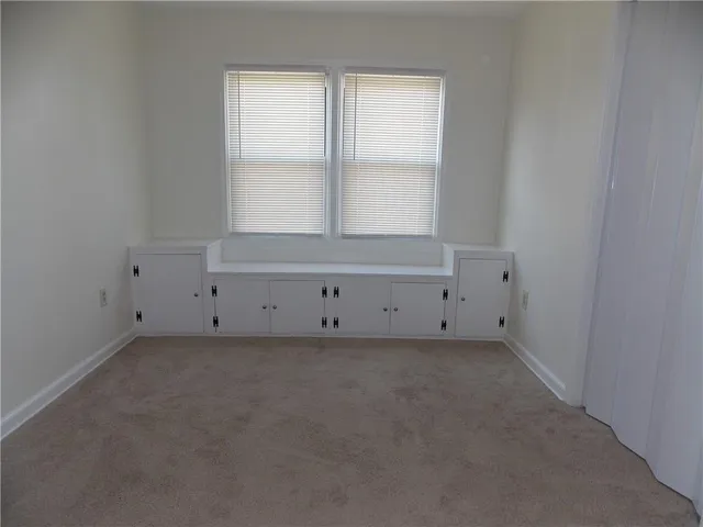 a view of a window in an empty room