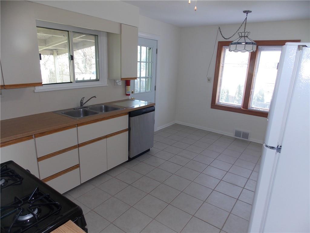 511 Pearl Avenue Mars, PA 16046 - Photo 5 of 21 a kitchen with a sink cabinets and window