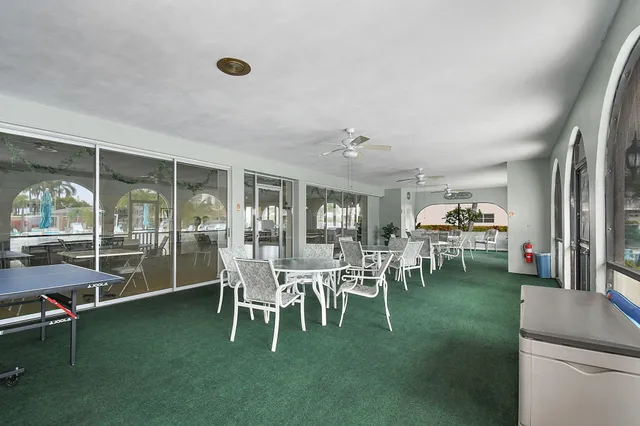 a view of a city street with cars