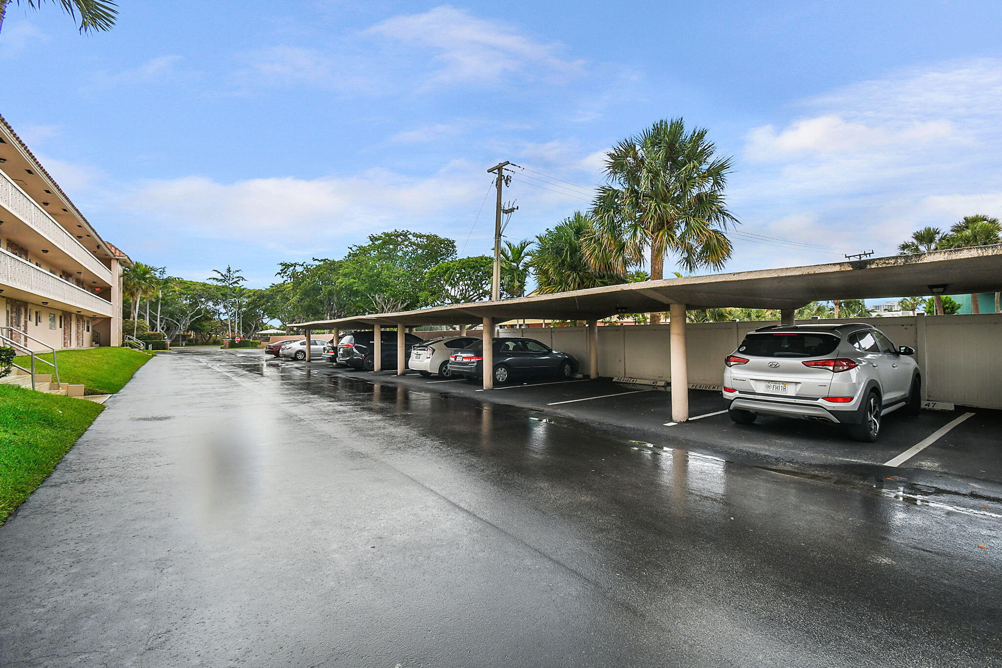 400 Northeast 20th Street, Unit A207 Boca Raton, FL 33431 - Photo 40 of 55 a view of a city street with cars