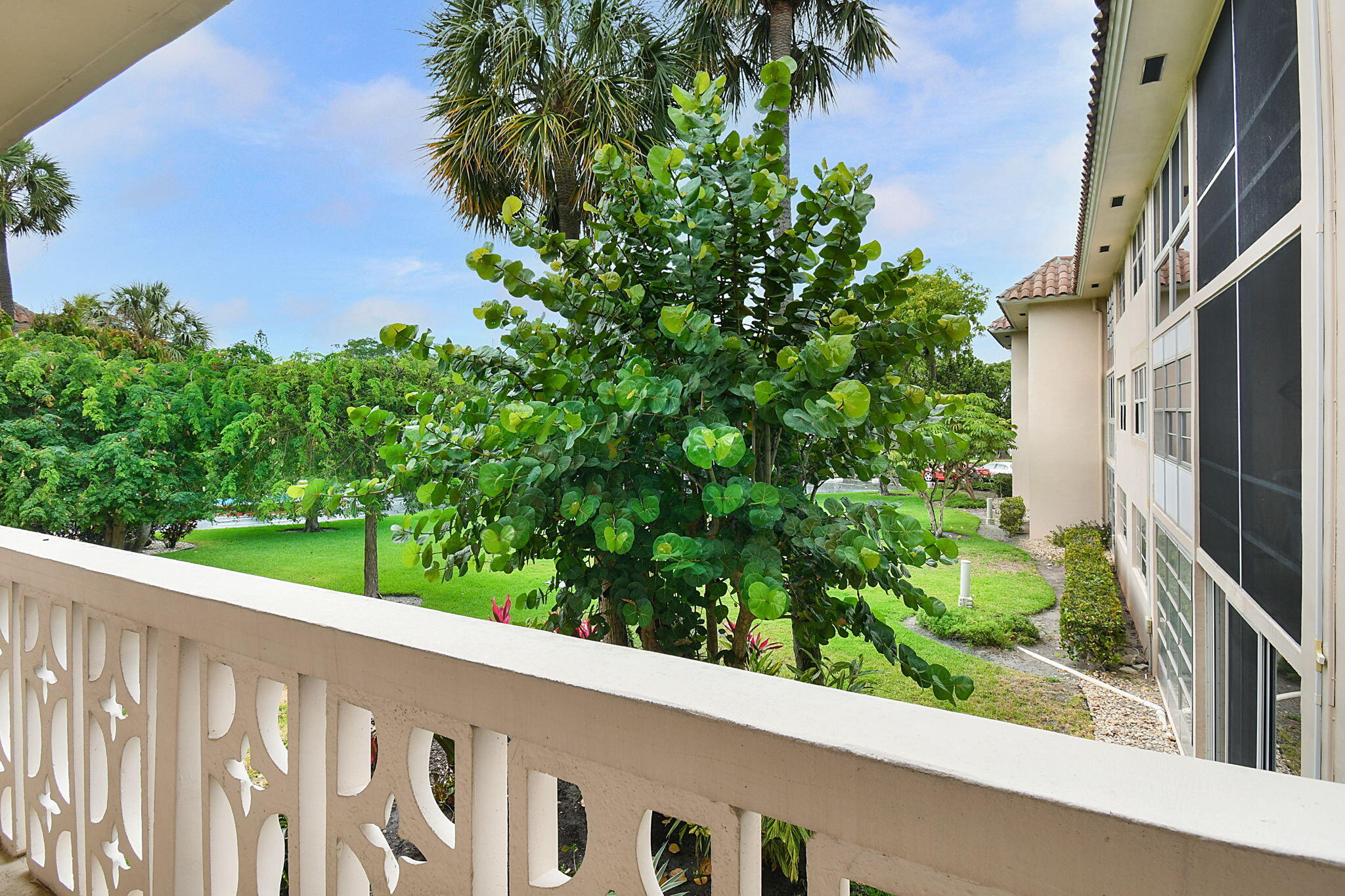 400 Northeast 20th Street, Unit A207 Boca Raton, FL 33431 - Photo 45 of 55 a balcony with street view