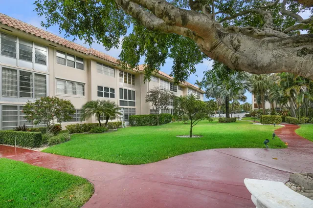 a view of a street with cars