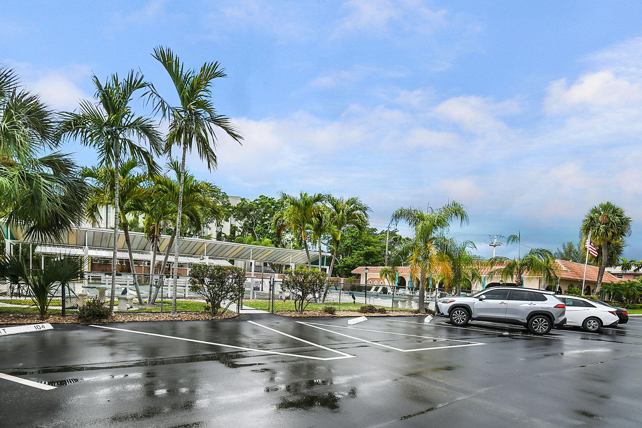 400 Northeast 20th Street, Unit A207 Boca Raton, FL 33431 - Photo 54 of 55 a view of a street with cars