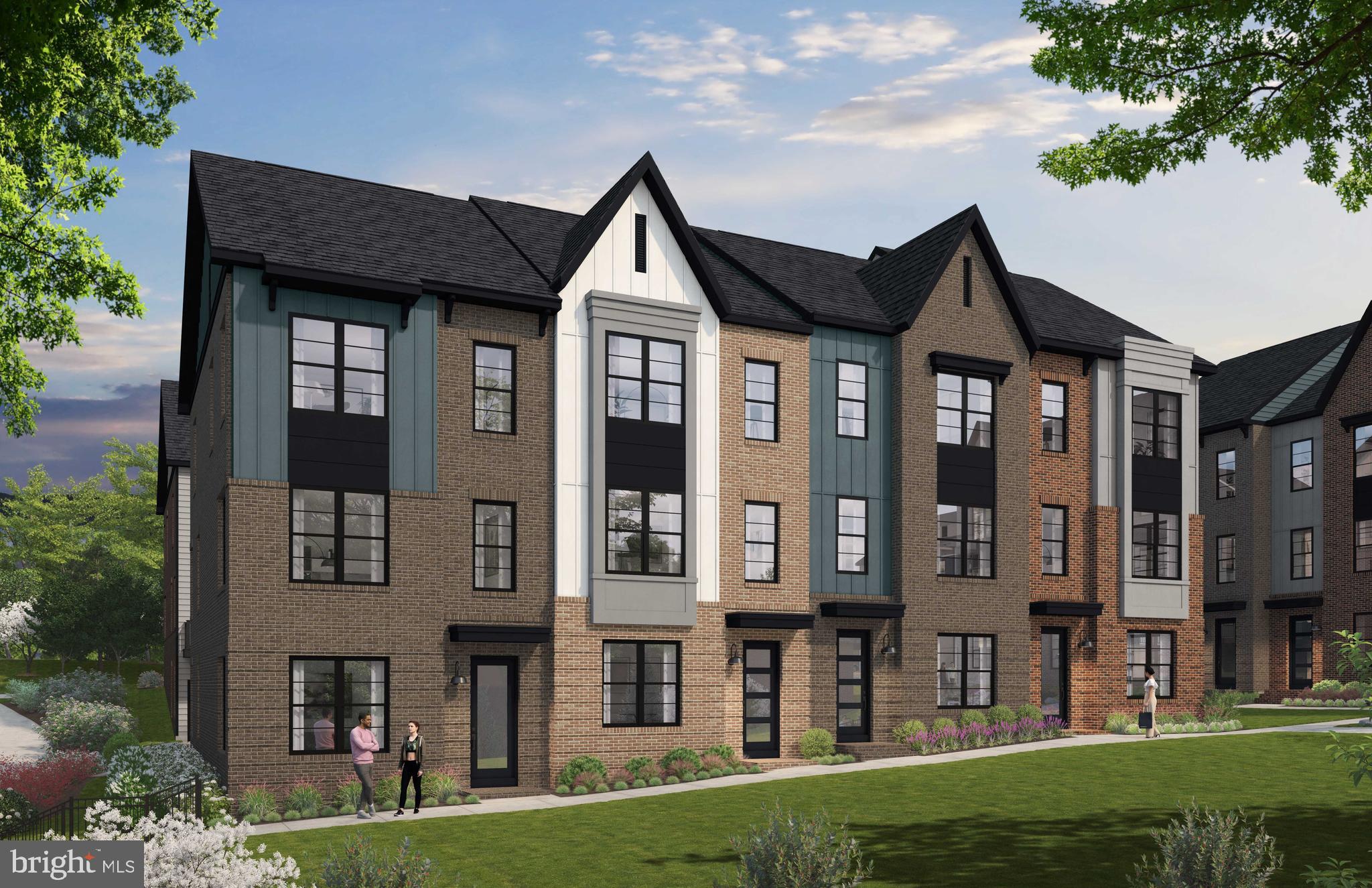 11663 Vantage Hill Road Reston, VA 20190 - Photo 4 of 22 a front view of a residential apartment building with a yard