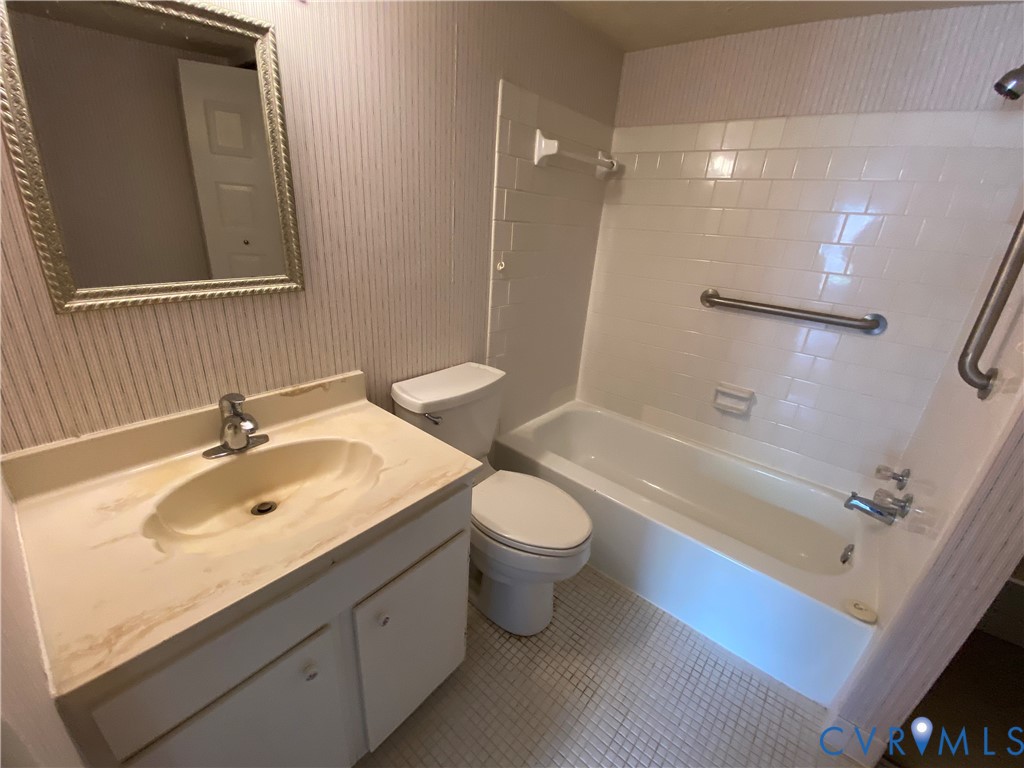 1507 Bronwyn Road, Unit 301 Henrico, VA 23238 - Photo 30 of 41 a bathroom with a sink a toilet and shower