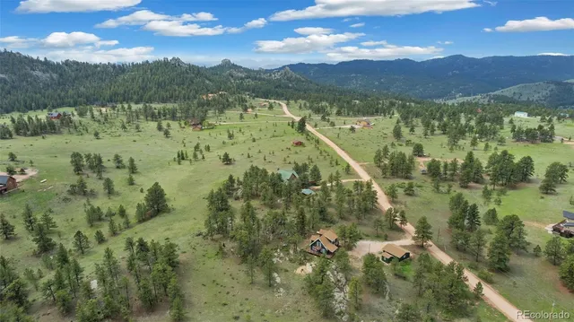 a view of lake with mountain