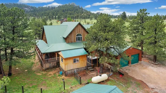a view of a chairs and table in patio