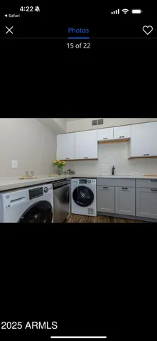 a kitchen with a sink a stove and microwave