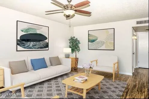 a living room with furniture and a rug