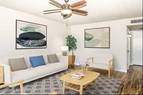 2339 West Northern Avenue, Unit 225 Phoenix, AZ 85021 - Photo 4 of 14 a living room with furniture and a rug