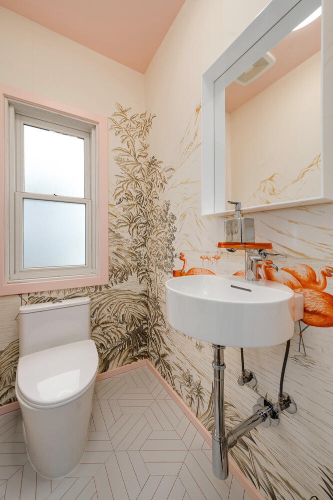 2333 Ridgeway Avenue Evanston, IL 60201 - Photo 17 of 35 a bathroom with a sink and a mirror