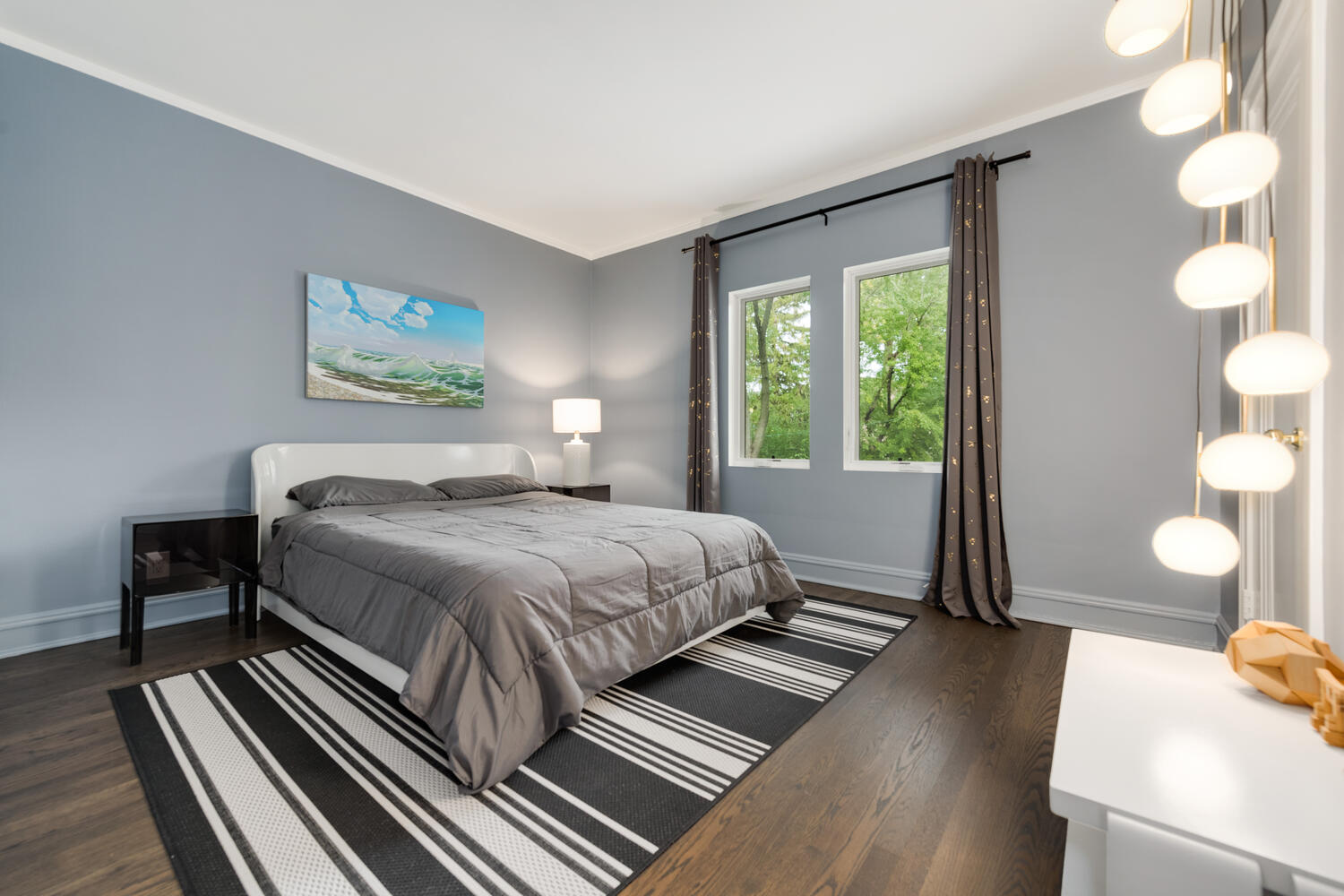 2333 Ridgeway Avenue Evanston, IL 60201 - Photo 18 of 35 a bedroom with a bed and a large window with outer view