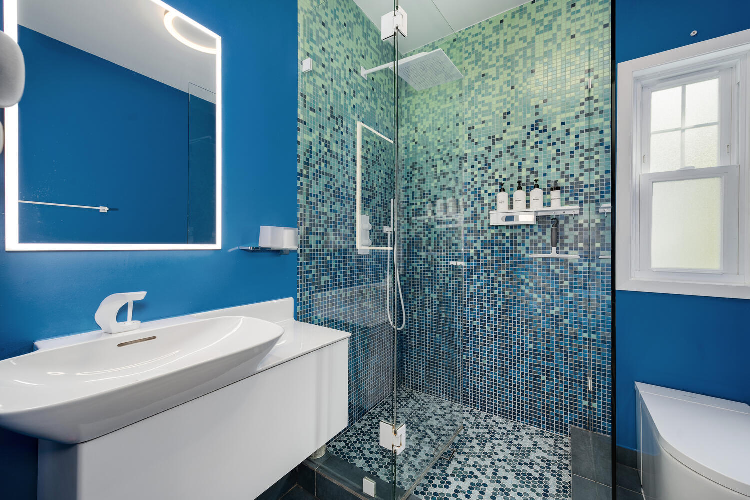 2333 Ridgeway Avenue Evanston, IL 60201 - Photo 26 of 35 a bathroom with a sink a toilet and shower